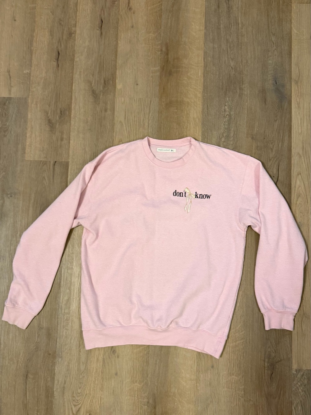 Simply Southern Don’t Care Pink Bow Graphic Sweatshirt M/L